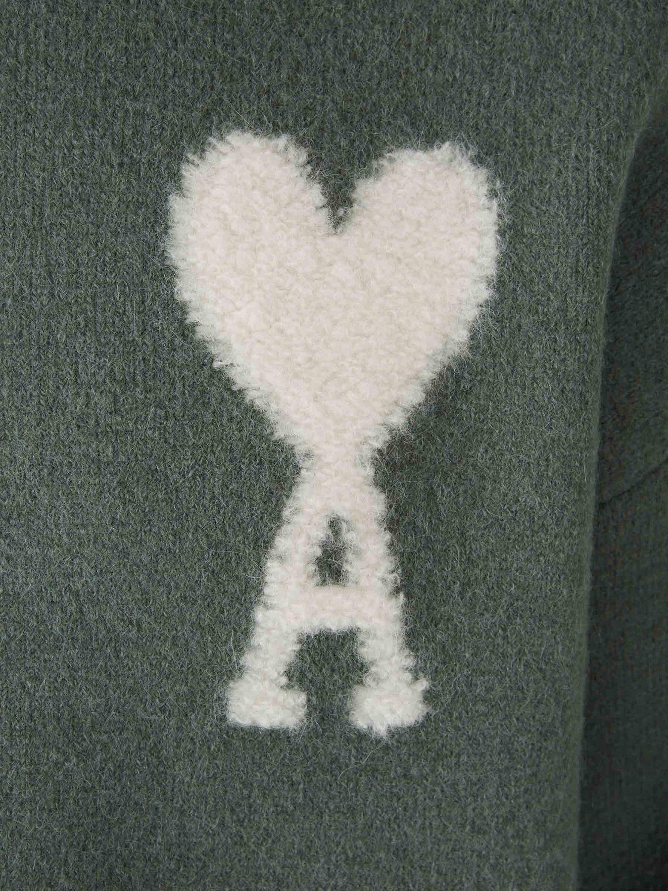 Grüner Friend Pullover mit weißem Herz