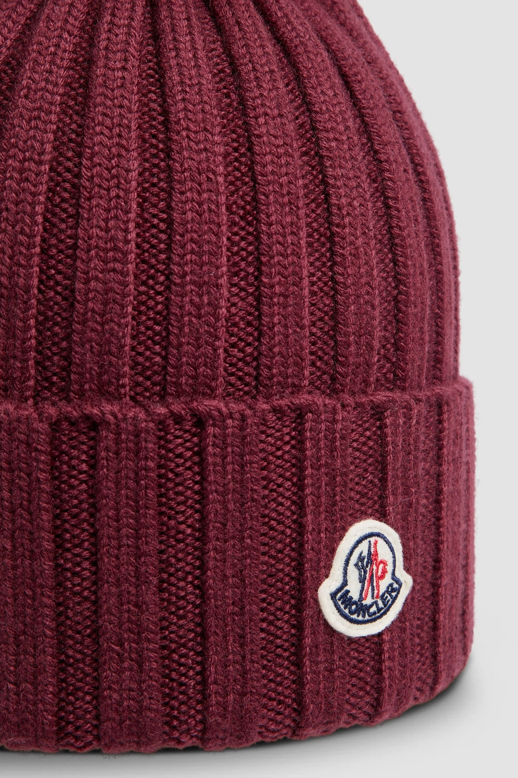 Bonnet en laine avec pompon Bordeaux