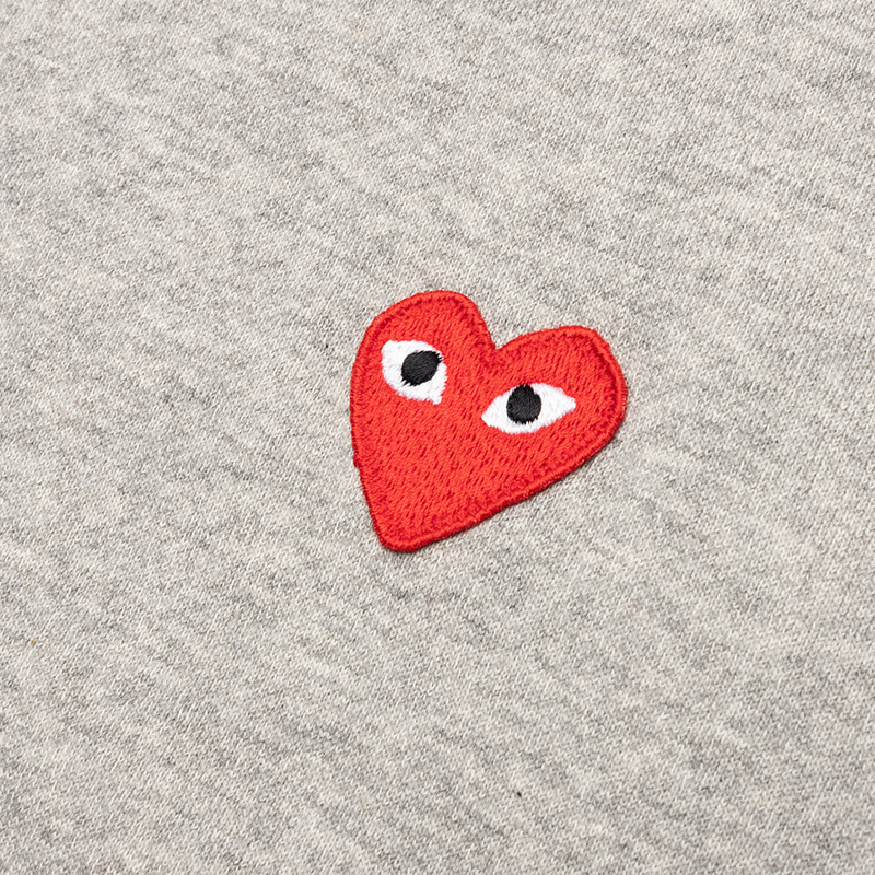 Graue Kapuzenjacke von CDG PLAY (Herzen auf dem Rücken)