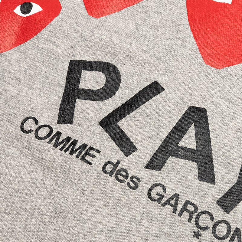 Graue Kapuzenjacke von CDG PLAY (Herzen auf dem Rücken)