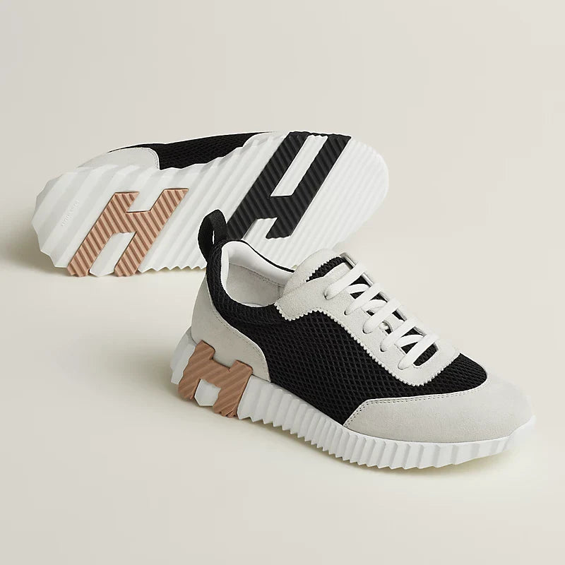 Hermès schwarz/weiße Sneakers