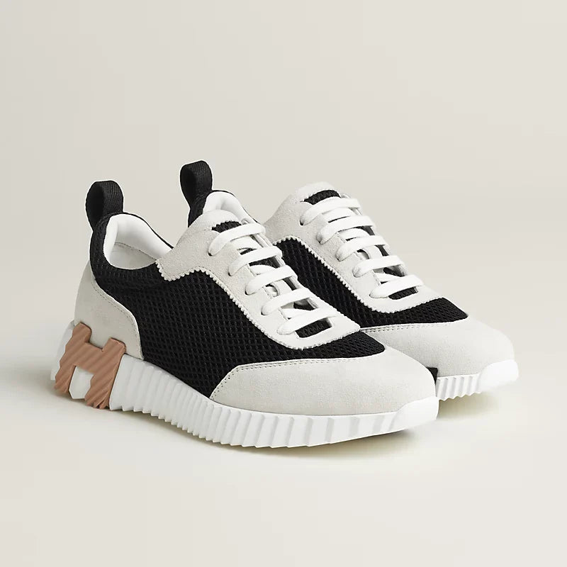 Hermès schwarz/weiße Sneakers