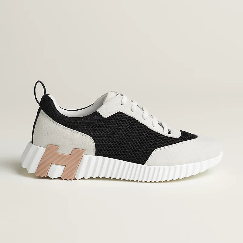 Hermès schwarz/weiße Sneakers
