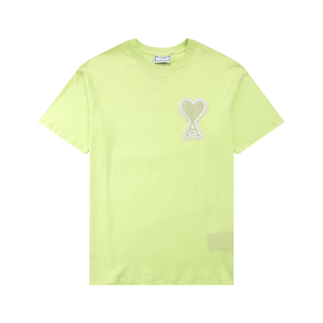 Gelbes T-Shirt mit weißem Herz von Ami Paris